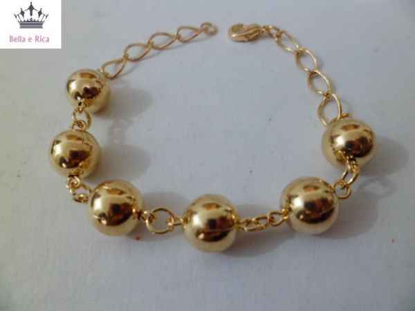 Pulseira com Bolas Douradas